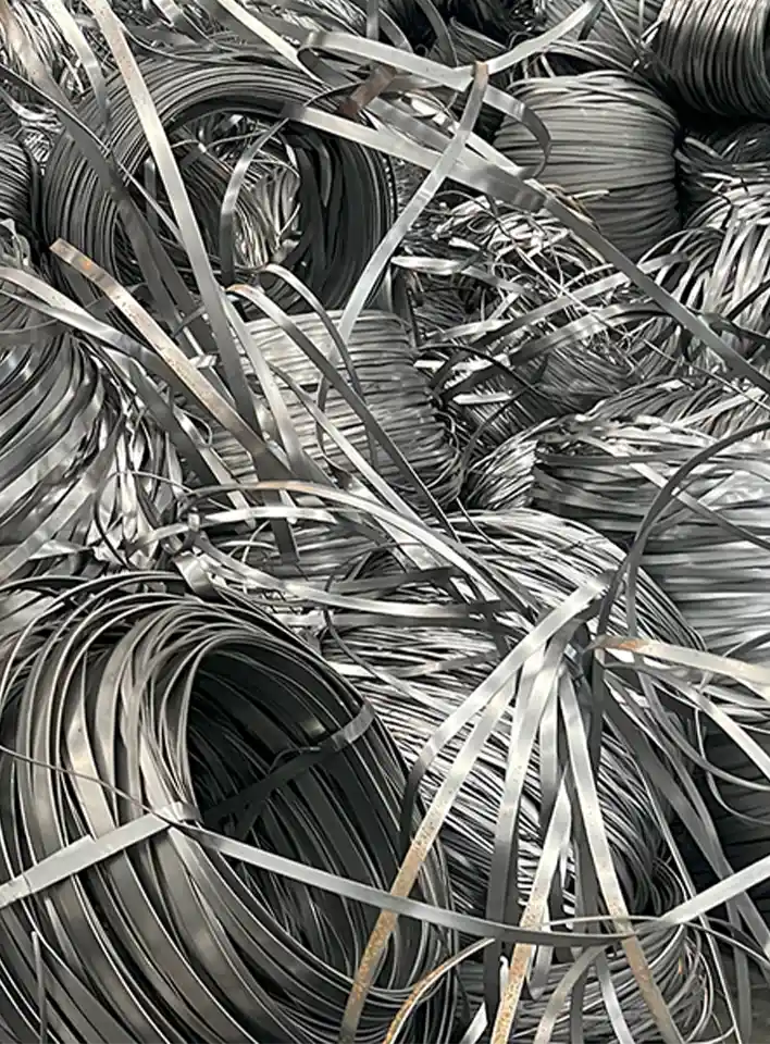Coil slitter scrap steel from cutting process – เศษเหล็กจากการตัดคอยล์โลหะในโรงงาน